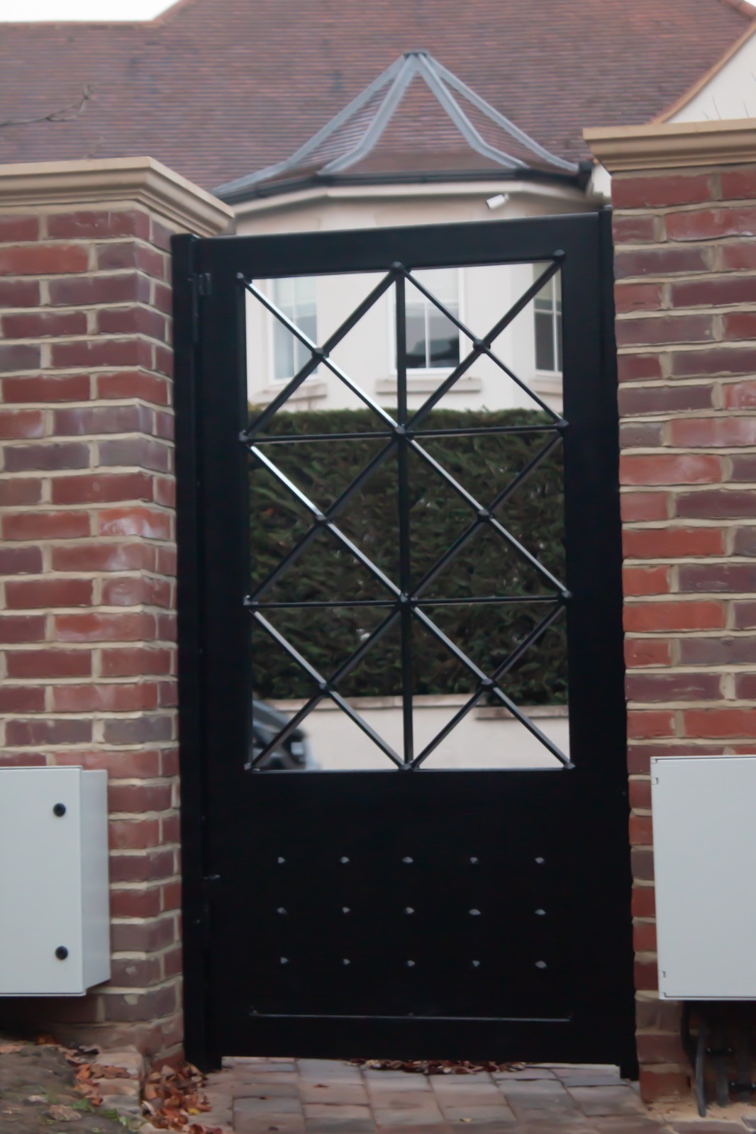 Double wooden driveway gates