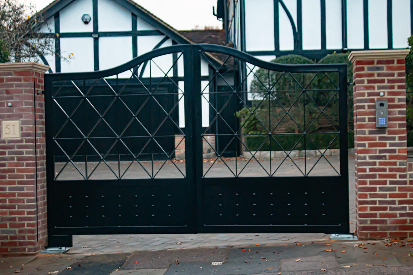 Double wooden driveway gates