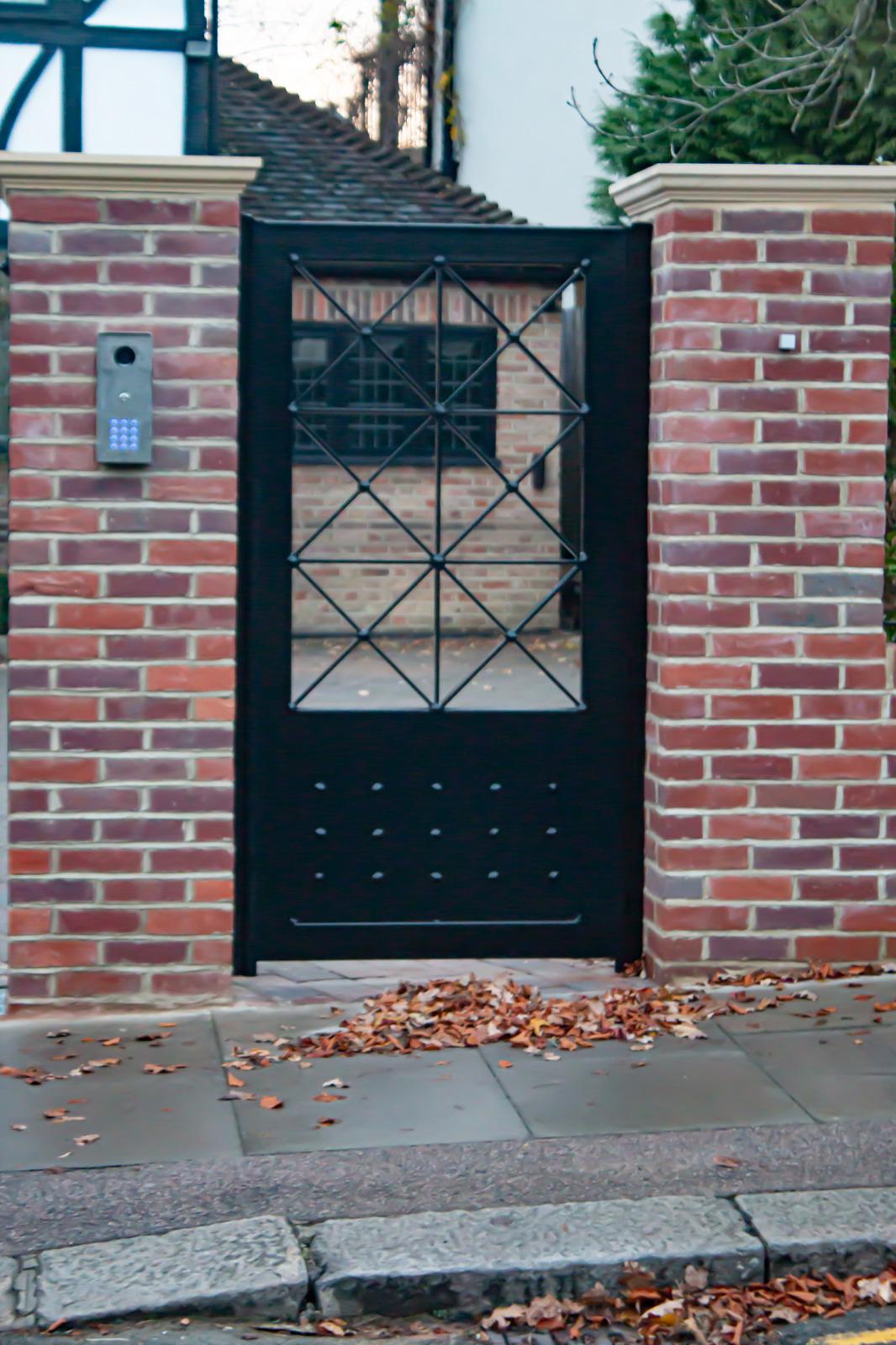 Double wooden driveway gates