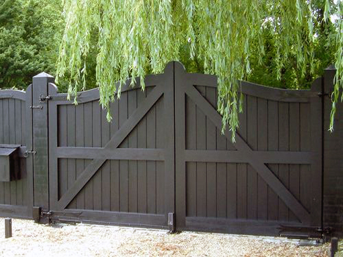 Double wooden driveway gates
